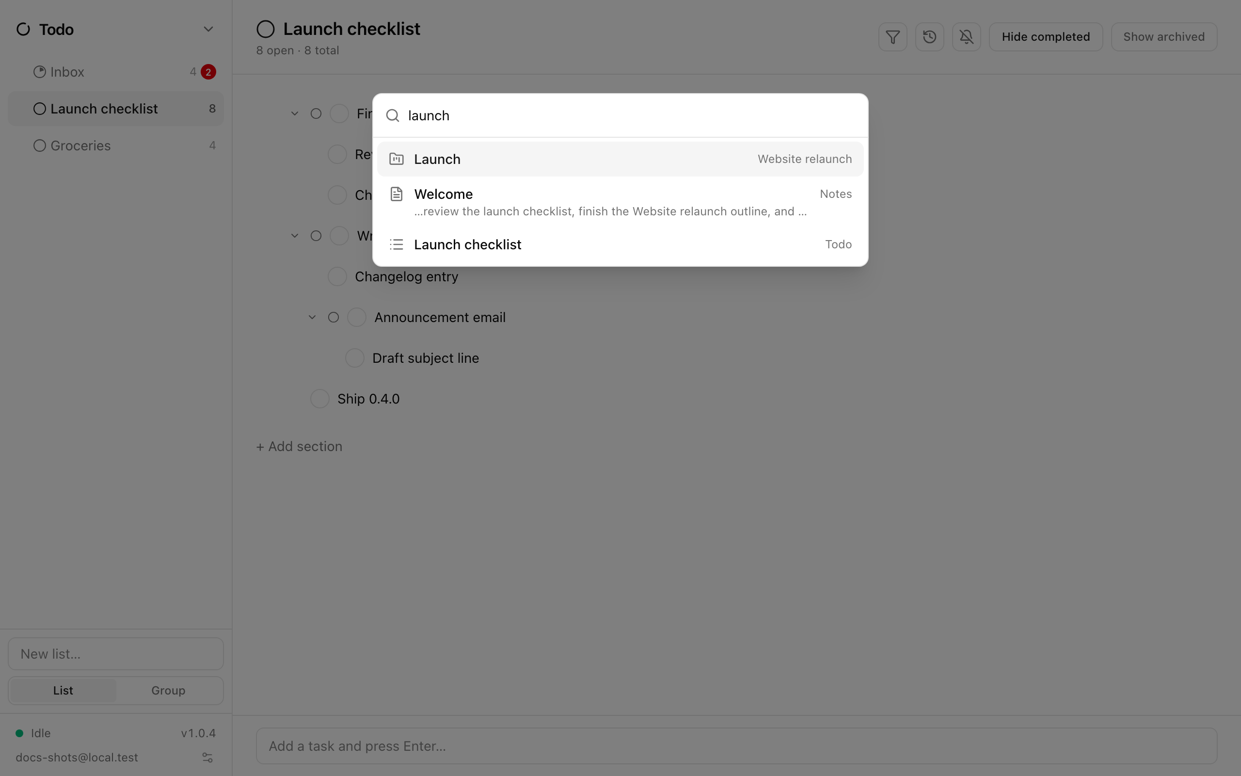 The search overlay with results from several apps, each showing its icon, title, snippet and container